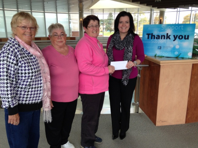 Therese Scheer and Friends make golf gift on Pink Day