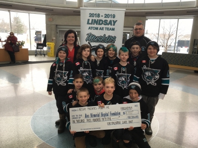 Young hockey players build philanthropy skills with support for palliative care